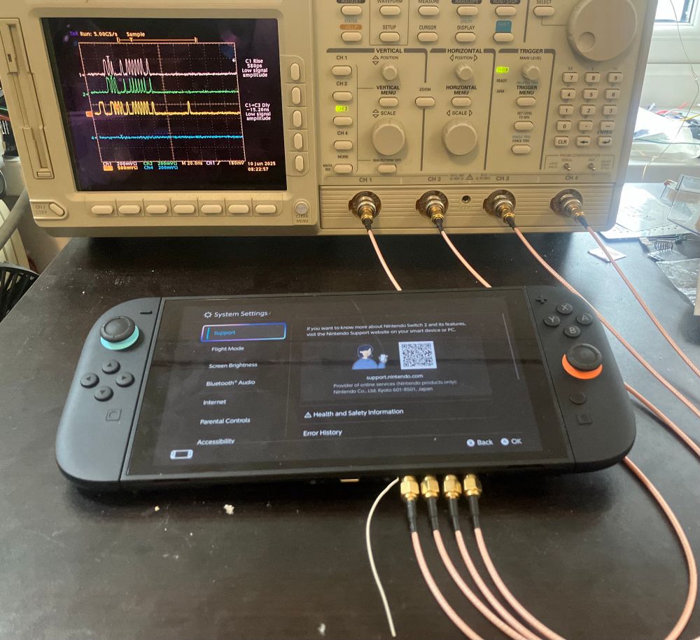 nintendo switch 2 connected to an oscilloscope by 4 coax cables