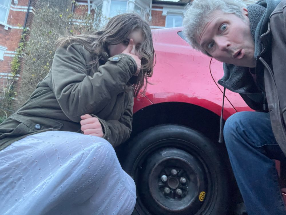 A selfie next to our newly fitted spare tyre