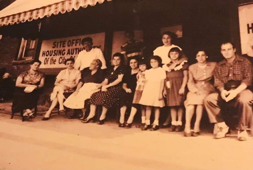 13 first and second generation Italian Immigrants posing for a pic outside the Passaic, NJ housing authority in early 1950s (possibly earlier). My great grandmother on the left was not fully Italian. She was of Spanish decent.