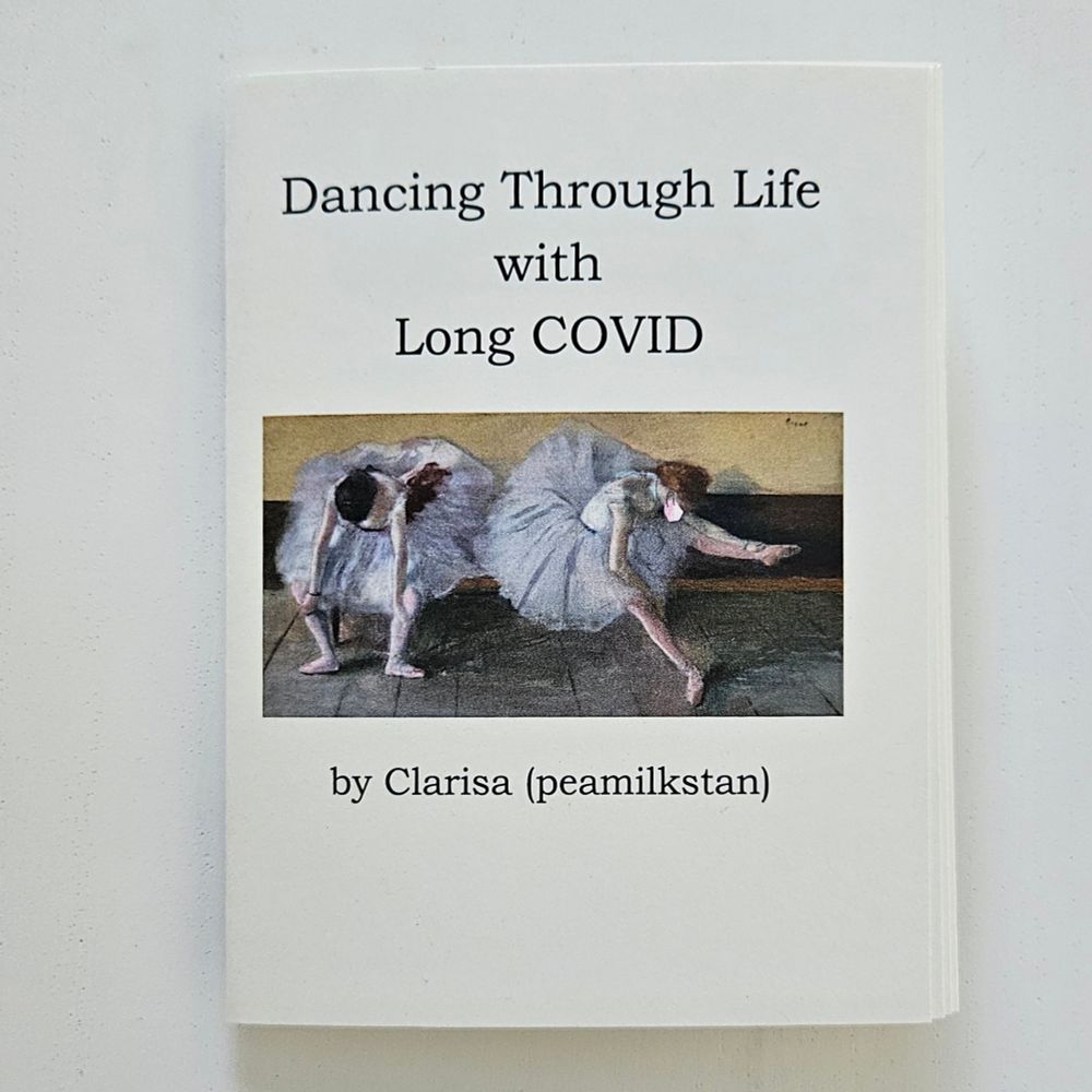 Photo of an ivory colored zine on a white background. The text on the zine says, "Dancing Through Life with Long COVID by Clarisa (peamilkstan)." There is a photo Degas artwork of two ballet dancers sitting, and a pink KN95 mask is edited on one dancer's face.