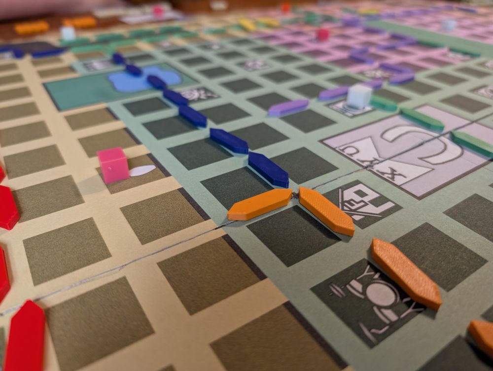 A zoomed in picture of the same map with colored paths on them. The paths are 3d printed.