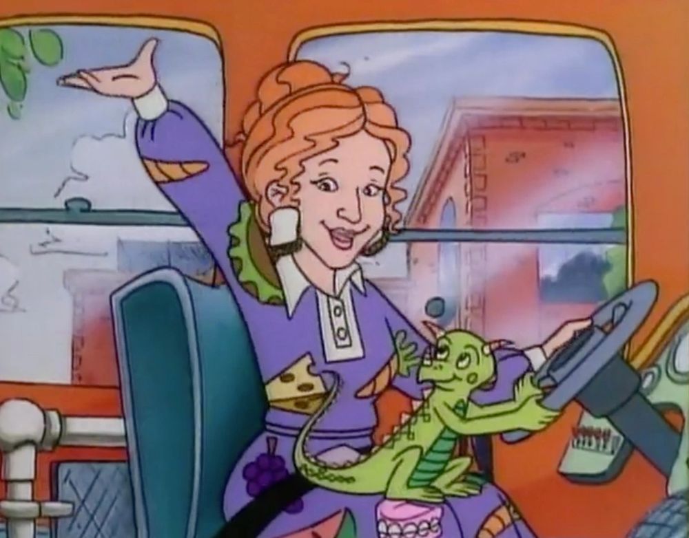 Ms Frizzle and her fuckass lizard, in the driver seat of the Magic School Bus