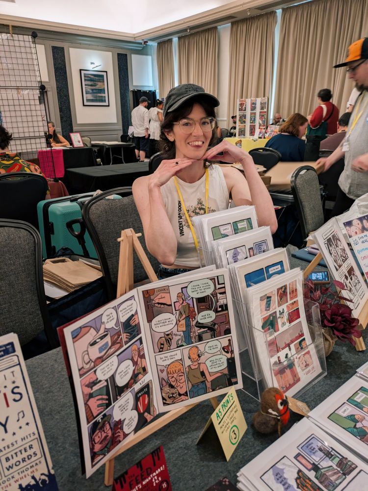 Lovely @catsinook at our convention table. 