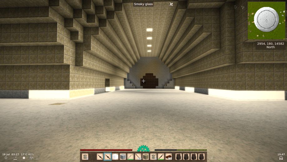 a video game screenshot from Vintagestory , a block  game  similar to  minecraft.  This  image  is  of the  interior of  a  construction . The  image  shows an intersection  of  two  'halls'  arch  shaped  a white stone floor  with  curved walls