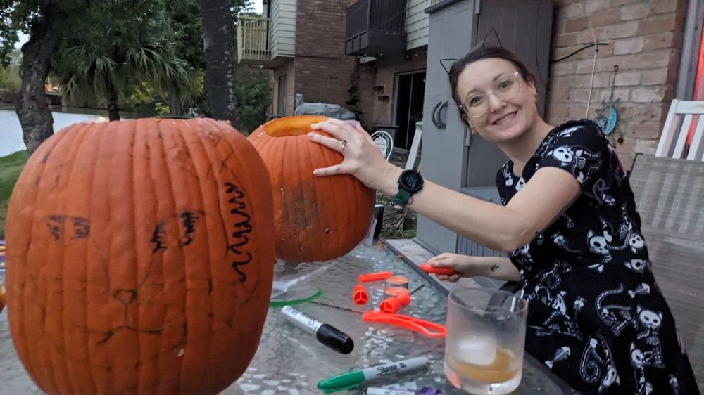 Amie carving pumpkins