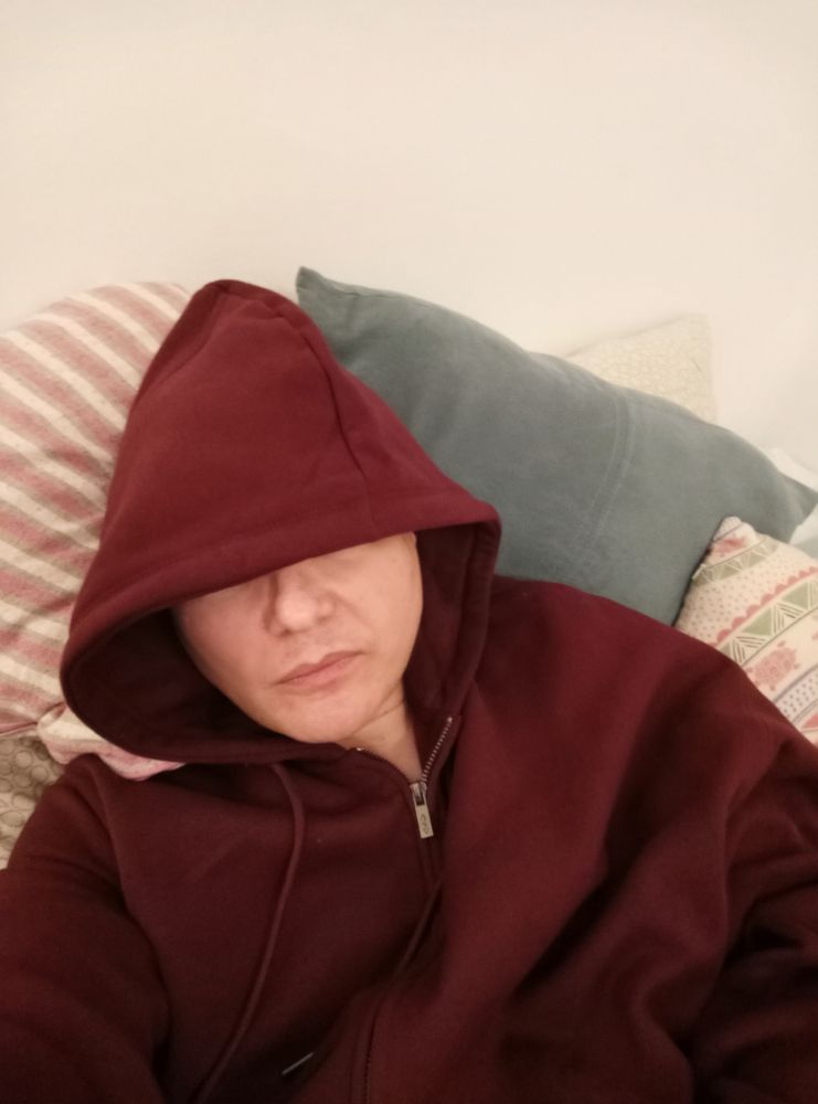 Me in a maroon hoodie. 