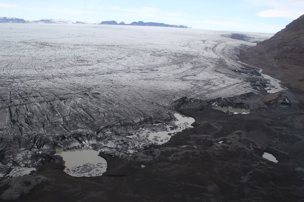 Photo of the eastern margin of Skeiðarárjökull taken in April 2022 showing the 2021 Grímsvötn jökulhlaup outlets (Photo: Andy Russell)