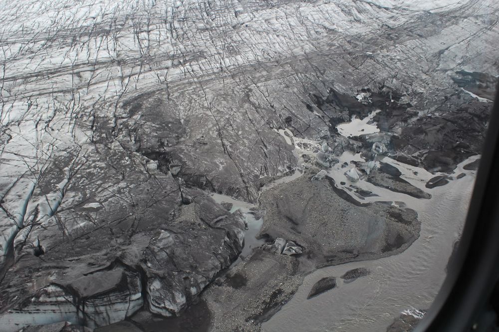 Photo of the eastern margin of Skeiðarárjökull taken in April 2022 showing the 2021 Grímsvötn jökulhlaup outlets (Photo: Andy Russell)