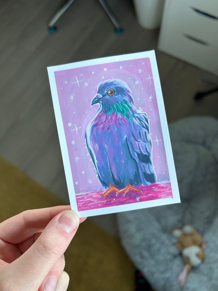 mini gouache painting of a pigeon. the pigeon stands proudly. the background is a light pink, with loads of sparkles. 
