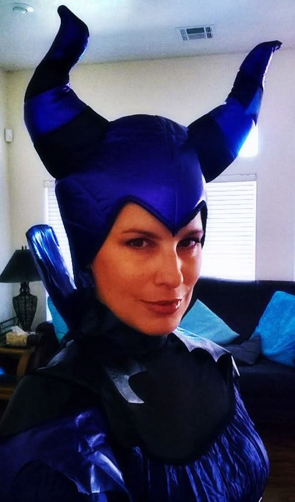 Woman dressed in purple Maleficent costume