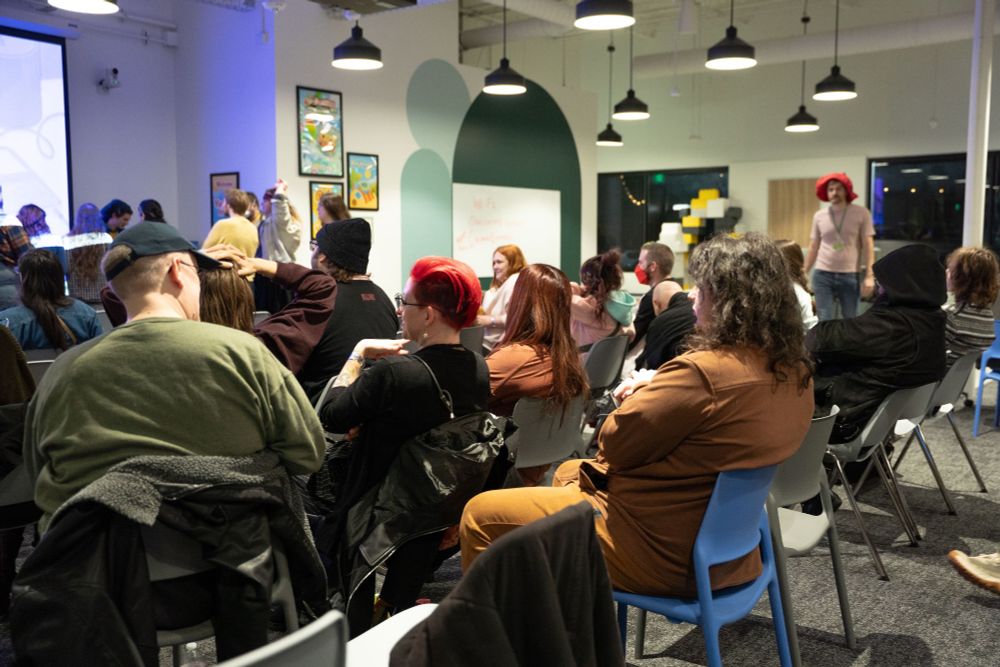 Games Y'all attendees seated, waiting for the next PowerPoint presentation