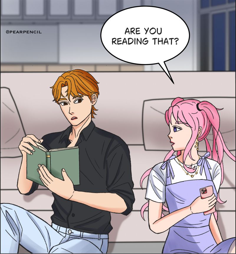 A boy wearing a black button-down shirt is reading a book. A girl with pink hair and wearing a lavender overall dress is looking at her phone. She is asking the boy if he is reading the book. 