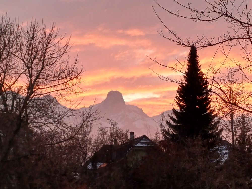 Sunset over a snowy mountain range
