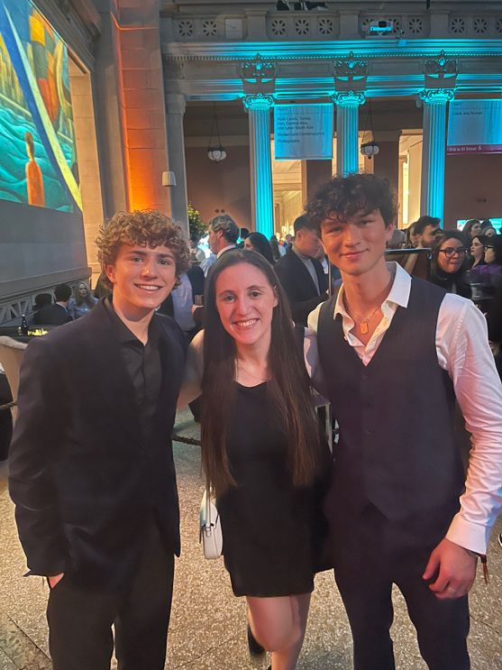 Gillian Blum at the “Percy Jackson” premiere, posing with Walker Scobell and Charlie Bushnell.