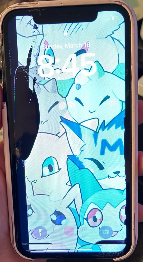 Photo of my old jank ass broke ass phone screen. The screen is cracked and there are a fuckload of dead pixels