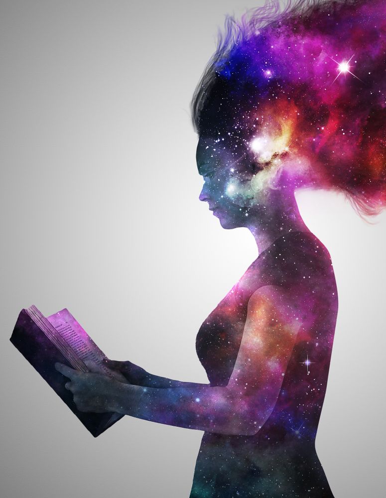 Silhouette of a woman reading, her body is the universe.