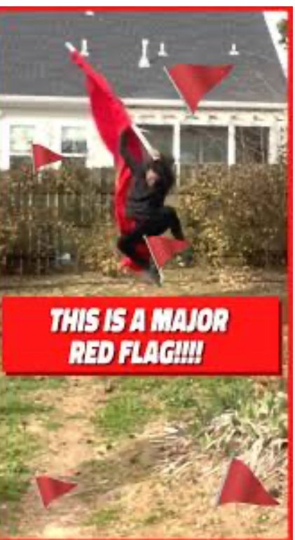 A man waving a huge red flag whilst leaping in the air surrounded by smaller red flags with a Chiron saying ‘this is a major red flag’ it’s a screenshot from a video of a young guy with a beard who does lots of these on instagram.  Appears to be shot in his garden (terrible lawn big brown patches) with a fence and his neighbours house in the background.  I’d guess he’s a cheerleader or similar who does the stuff where they dance with flags at ball games.  That’s the vibe I’m getting anyhow.  I’m trying to Make these alt text descriptions richer because an image is much more than ‘man with red flag’ sighted people get all that secondary information so why not.  Let me know in the comments what you find more helpful- four word descriptions or the more detailed version and I’ll go with the majority.  Take care ❤️