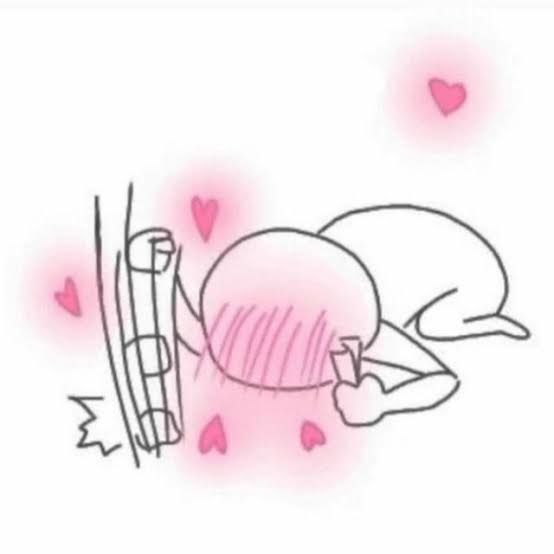 Person kneeling and hiding their face while blushing and punching the ground repeatedly, hearts floating around them