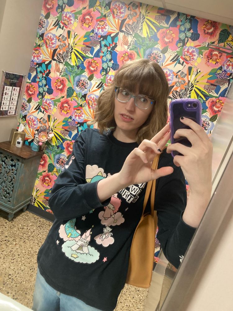 picture of me with my hair cut, its shoulder length now and my bangs dont block my eyes anymore