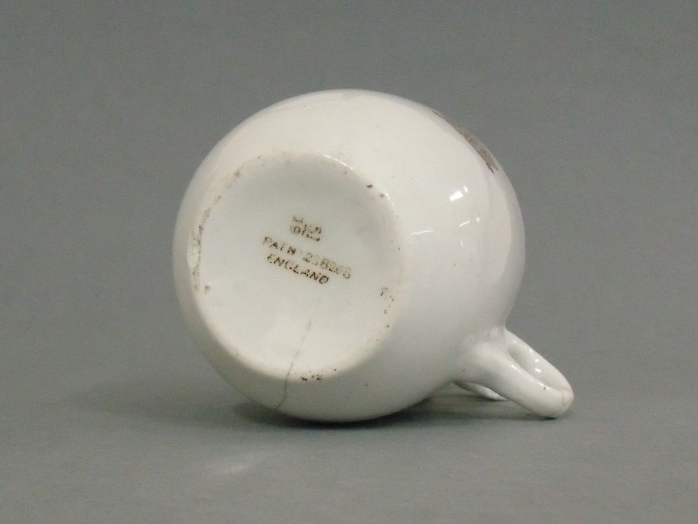 Underside of the white ceramic NAAFI cup