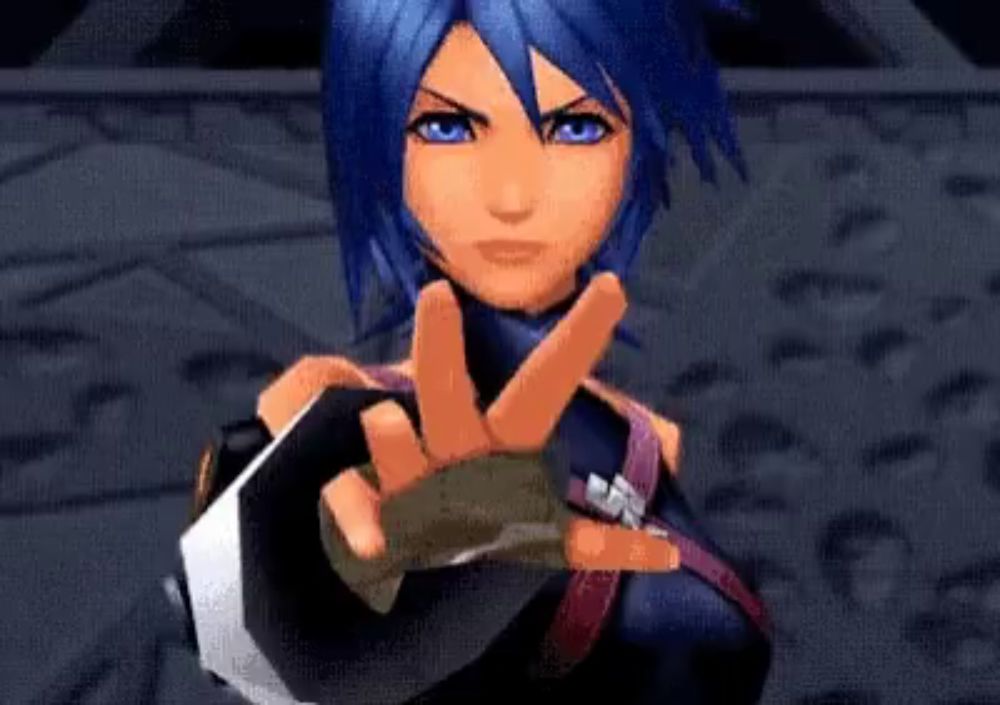 aqua from kingdom hearts is giving the peace sign in a video game .