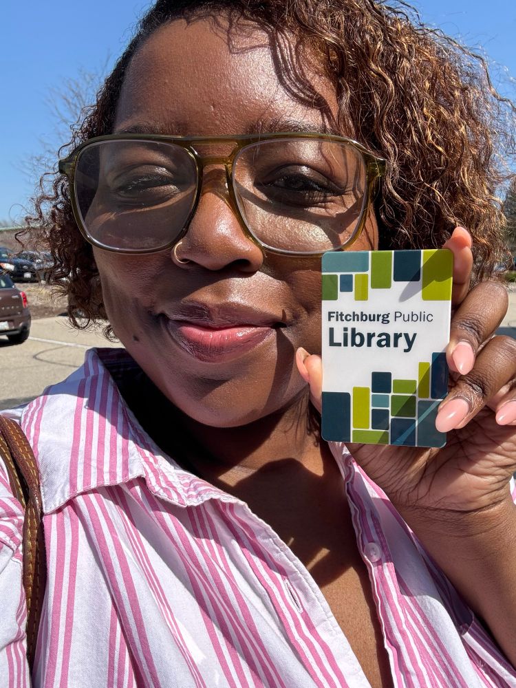 Aireale holding her new public library card!