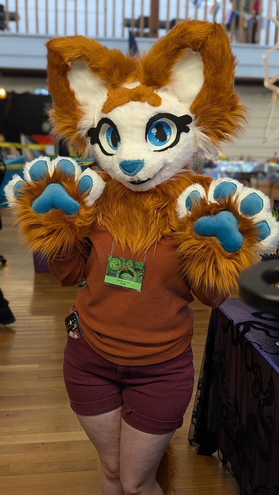 An adorable furry cosplayer