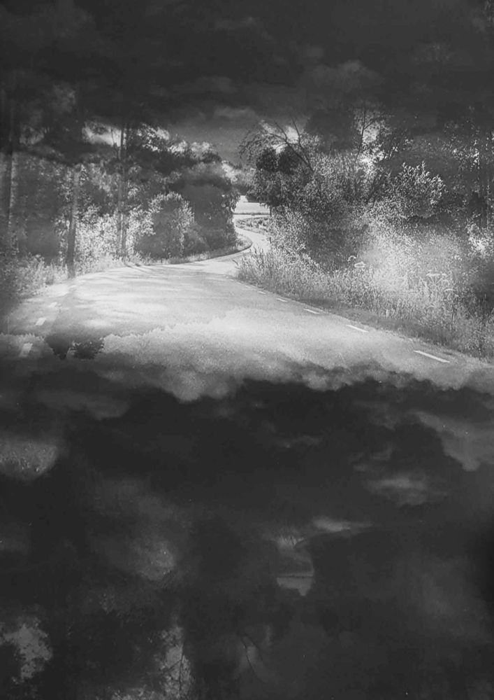 A road made of clouds. Handmade in the darkroom.