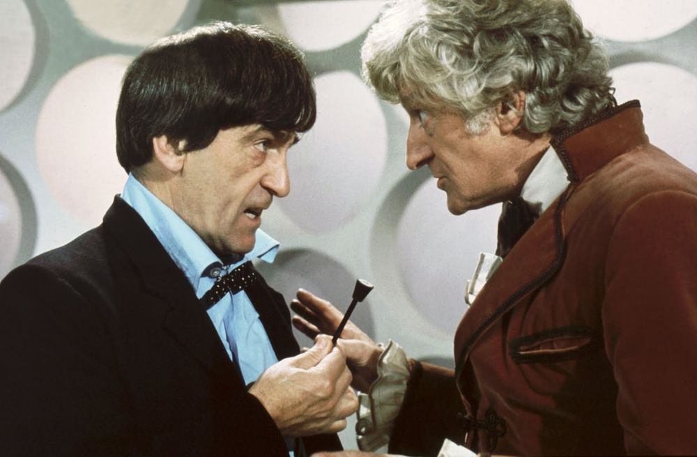 The second and the third doctor discussing what to do, standing in the TARDIS as they are about to face their biggest enemy yet! (A scene from The Three Doctors, 1972)