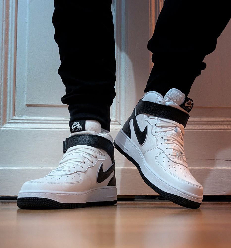 Dragon paws with some mid black and white AirForce1's on. 