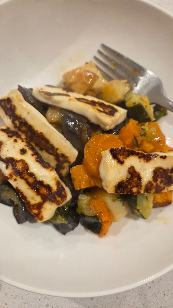 Roast veggies topped with grilled halloumi. 