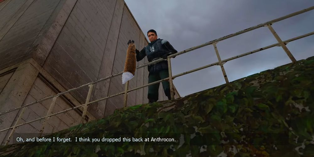 An altered screenshot from Half Life 2. Barney Calhoun leans over a railing above you, but instead of a crowbar he's holding a fox fursuit tail. His dialog reads: "Oh and before I forget. I think you dropped this back at Anthrocon."