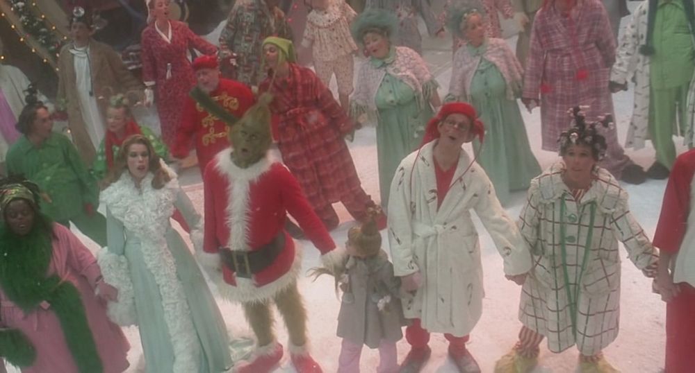 The ending of How The Grinch Stole Christmas where the townspeople hold hands and sing. Cindy Lou Who holds hands with the Grinch and her father