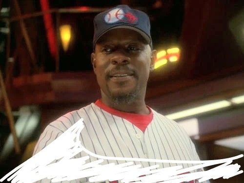 Benjamin Sisko in his Niniers baseball pinstripes