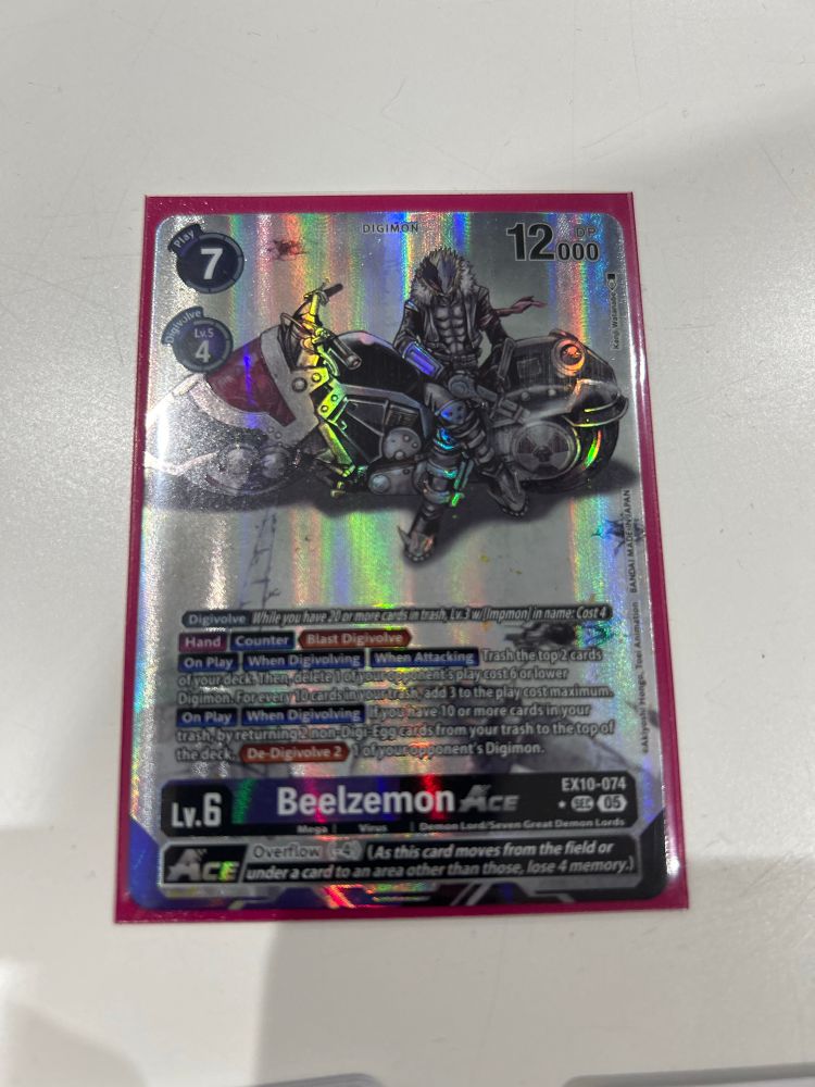 A Digimon TCG card featuring Beelzemon, a biker-like demon, sitting on his motercycle. The art is giving off Akira vibes.