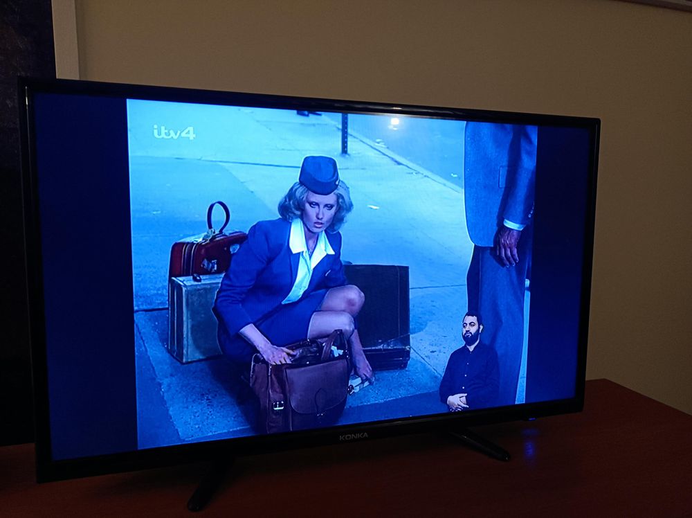 Morgan Fairchild plays a flight attendant. 