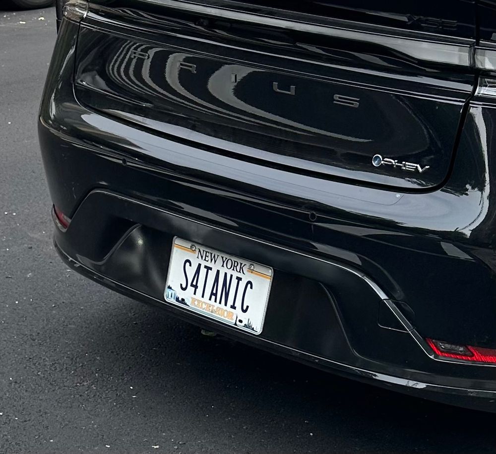 Black Toyota Prius with the license plate “S4TANIC” (Satanic)