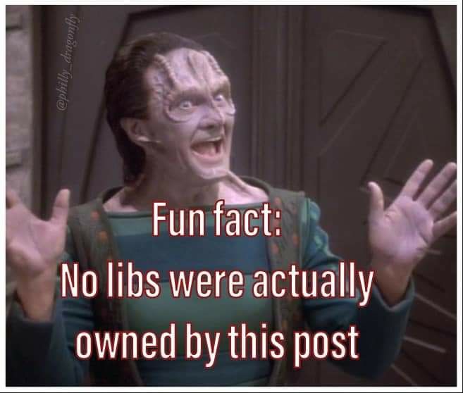 An image of Garak from Star Trek: Deep Space Nine. His hands are in front of him and splayed out to the side. He has a wide, open-mouth smile on his face. The caption reads, "Fun fact: No libs were actually owned by this post."
