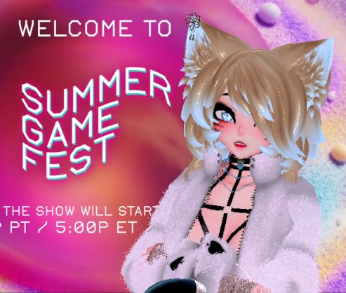 Tmiah komodo-hyping next to the summer games fest banner