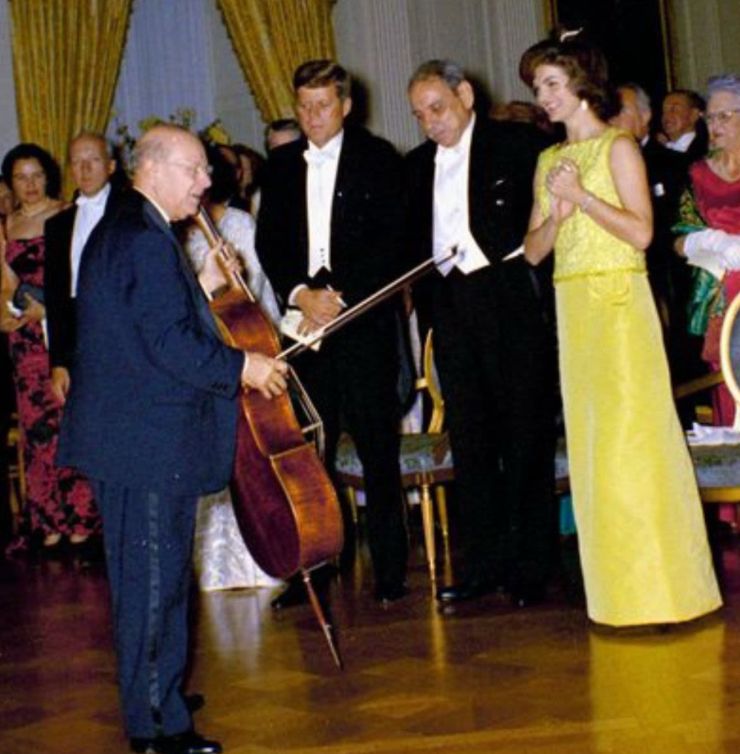 President John Kennedy and First Lady Jacqueline Kennedy with cellist Pablo Casals at the White House. 