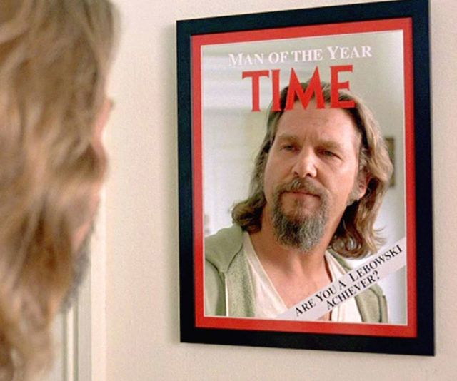 Screengrab from The Big Lebowski where the dude looks into a mirror made to appear like the cover of Time magazine declaring him Man of the Year.