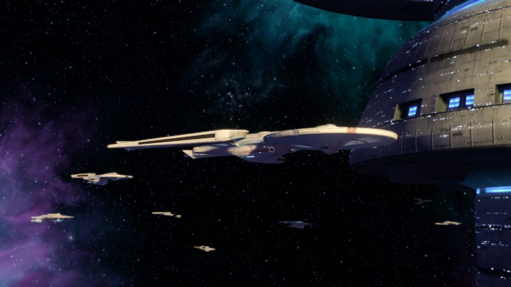 The Okinawa Class in front of a starbase, with several other TMP vessels in the background.