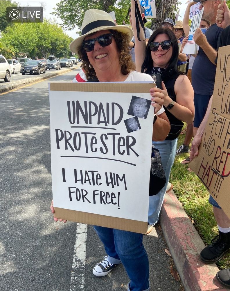 Protester at a No Kings rally.
Unpaid Protester 
I hate him for free