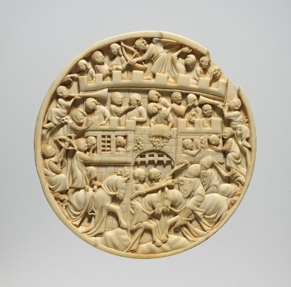 Roundel featuring a scene of the Attack on the Castle of Love, from circa 1320-40. Made in Paris France on Elephant Ivory. In this particular image we see knights attacking the castle whilst women of the castle hurl roses at them. The top of the castle is perched the God of Love with his bow and arrow. 

This roundel seemed a fitting medieval artefact to include in our discussion of Valentine's Day.