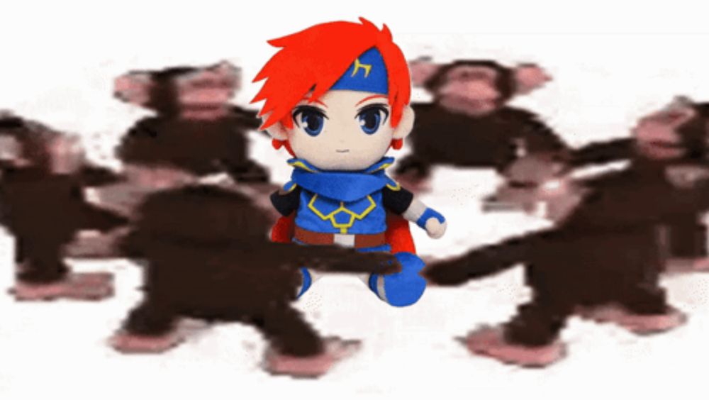 a stuffed toy of a boy with red hair and a blue cape