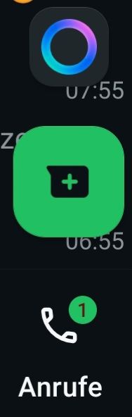Screenshot aus der WhatsApp-App, mit einem runden, bunten Kreis für die Meta-AI über dem Nachrichten- und dem Anrufe-Symbol.