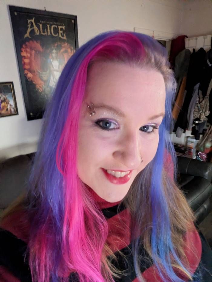 Gal with aggressively pink and purple hair.