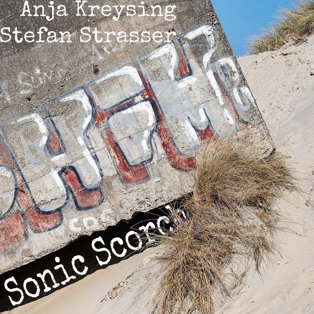 Album Cover, Concrete  with Graffiti. Sand, Gras, Blue sky