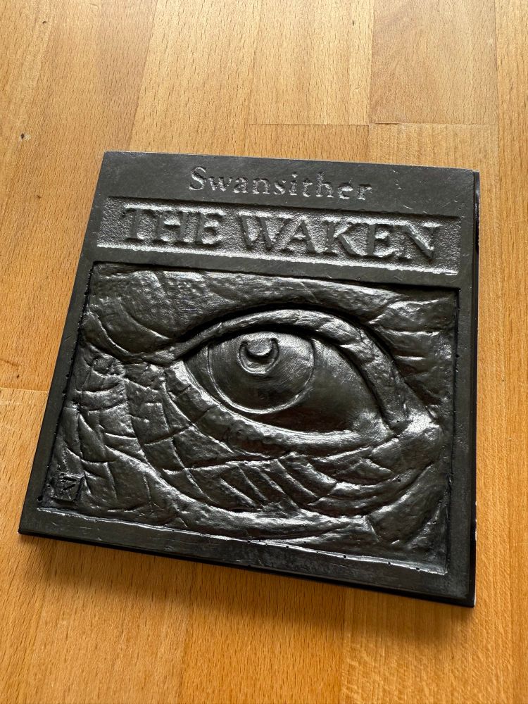 Cover of Swansither album The Waken with sculpted cover
