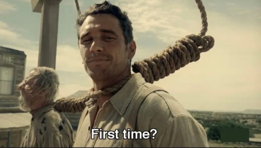 James Franco with a noose around his neck saying, "First time?"